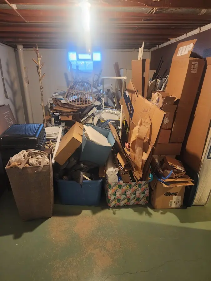 Roll-off dumpster container at job site for 15 Yard Dumpster Rental in St. James